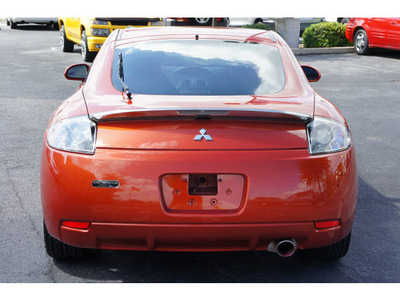 mitsubishi eclipse 2006 orange hatchback gt gasoline 6 cylinders front wheel drive 6 speed manual 76543