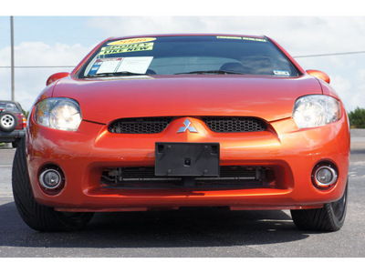 mitsubishi eclipse 2006 orange hatchback gt gasoline 6 cylinders front wheel drive 6 speed manual 76543