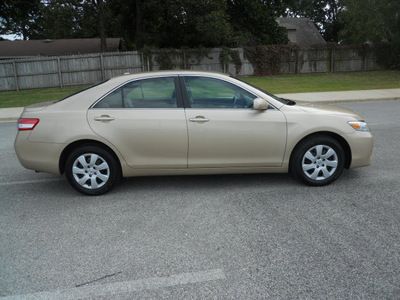 toyota camry 2011 tan sedan le gasoline 4 cylinders front wheel drive automatic 75604