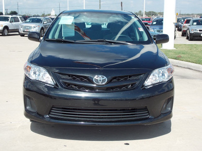 toyota corolla 2011 black sedan le gasoline 4 cylinders front wheel drive automatic with overdrive 77469