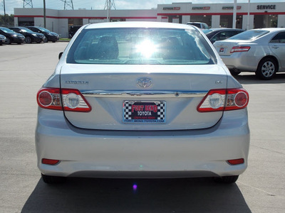 toyota corolla 2011 silver sedan le gasoline 4 cylinders front wheel drive automatic with overdrive 77469