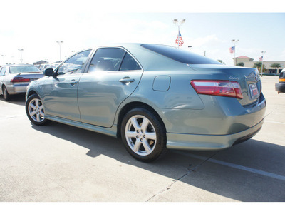 toyota camry 2007 lt  green sedan se gasoline 4 cylinders front wheel drive automatic 77034