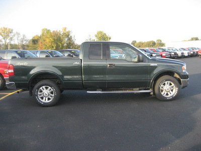 ford f 150 2004 green lariat gasoline 8 cylinders 4 wheel drive automatic with overdrive 62863