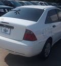 ford focus 2007 white sedan gasoline 4 cylinders front wheel drive automatic 77338