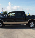 ford f 150 2012 black lariat gasoline 6 cylinders 4 wheel drive automatic 77521