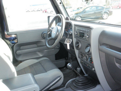 jeep wrangler 2007 black suv x gasoline 6 cylinders 4 wheel drive 6 speed manual 55124