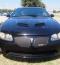 pontiac gto 2005 black coupe gasoline 8 cylinders rear wheel drive automatic 75067