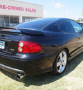 pontiac gto 2005 black coupe gasoline 8 cylinders rear wheel drive automatic 75067