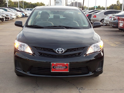 toyota corolla 2011 black sedan le gasoline 4 cylinders front wheel drive automatic with overdrive 77074