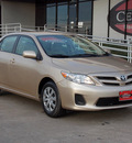 toyota corolla 2011 tan sedan le gasoline 4 cylinders front wheel drive automatic with overdrive 77074