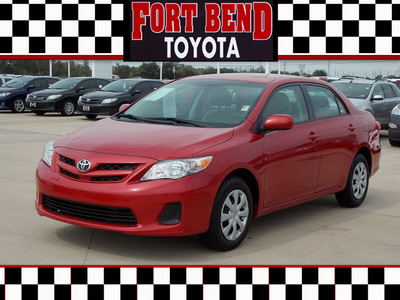 toyota corolla 2011 red sedan le gasoline 4 cylinders front wheel drive automatic with overdrive 77469