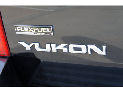 gmc yukon 2009 black suv slt flex fuel 8 cylinders 2 wheel drive automatic 77094