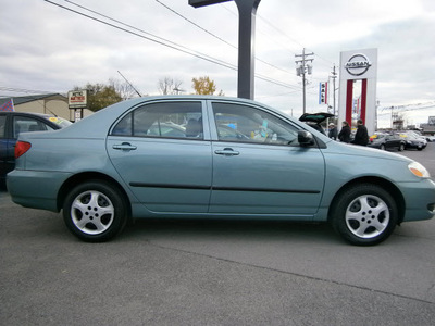 toyota corolla 2005 green sedan 4 cylinders automatic with overdrive 13502