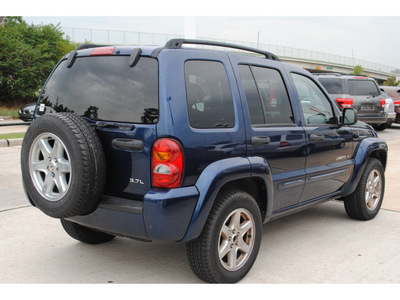 jeep liberty 2003 blue suv limited 6 cylinders automatic 77090