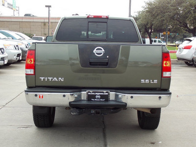 nissan titan 2005 dk  green le flex fuel 8 cylinders 4 wheel drive automatic with overdrive 77477