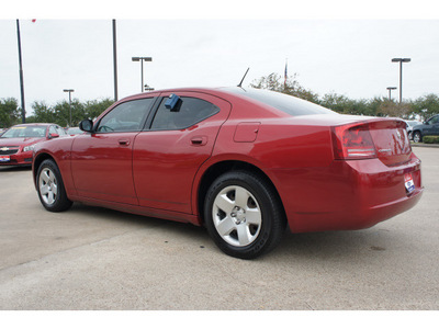 dodge charger 2008 red sedan gasoline 6 cylinders rear wheel drive automatic 77566