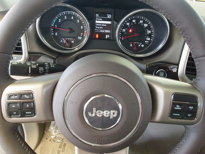 jeep grand cherokee 2013 lt  blue suv laredo e 6 cylinders automatic 78624