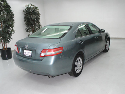 toyota camry 2010 green sedan le gasoline 4 cylinders front wheel drive automatic 91731