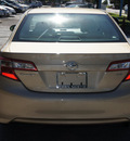 toyota camry 2012 tan sedan le gasoline 4 cylinders front wheel drive automatic 75080