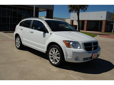 dodge caliber 2011 white hatchback heat gasoline 4 cylinders front wheel drive automatic with overdrive 77642