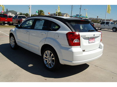 dodge caliber 2011 white hatchback heat gasoline 4 cylinders front wheel drive automatic with overdrive 77642