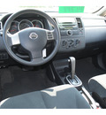nissan versa 2011 black hatchback gasoline 4 cylinders front wheel drive automatic 78552