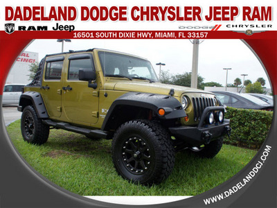 jeep wrangler unlimited 2008 lt  green suv x 6 cylinders 6 speed manual 33157