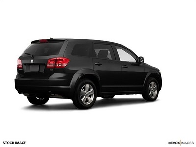 dodge journey 2009 black suv sxt gasoline 6 cylinders front wheel drive 6 speed automatic 77532