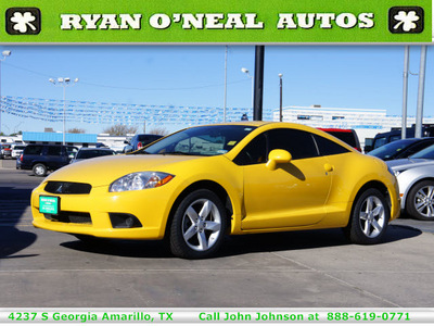mitsubishi eclipse 2009 yellow coupe gs 4 cylinders automatic 79110