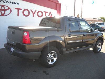 ford explorer sport trac 2005 brown suv flex fuel 6 cylinders 4 wheel drive automatic 79925