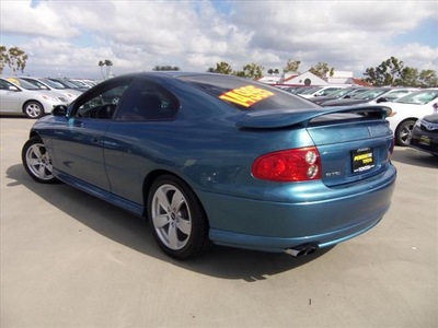 pontiac gto 2004 blue coupe gasoline 8 cylinders rear wheel drive automatic 90241