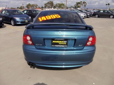 pontiac gto 2004 blue coupe gasoline 8 cylinders rear wheel drive automatic 90241