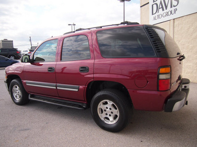 chevrolet tahoe 2006 red suv gasoline 8 cylinders rear wheel drive automatic 76011