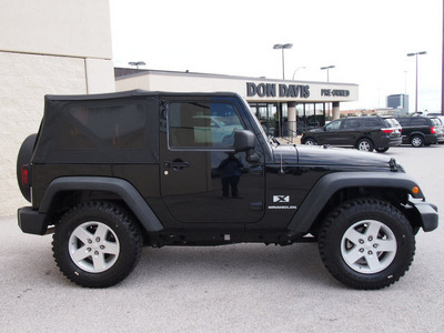 jeep wrangler 2009 black suv x gasoline 6 cylinders 4 wheel drive automatic with overdrive 76011