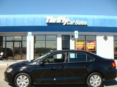 volkswagen jetta 2011 black sedan 5 cylinders automatic 79936