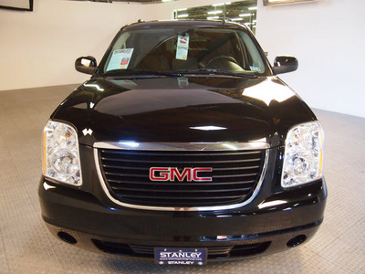 gmc yukon 2009 black suv sle 8 cylinders automatic 75219