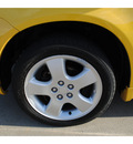 dodge neon 2003 yellow sedan r t gasoline 4 cylinders front wheel drive standard 77539