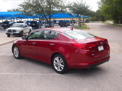 kia optima 2012 dk  red sedan lx gasoline 4 cylinders front wheel drive automatic 76049