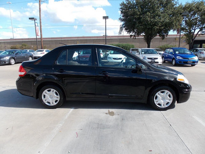nissan versa 2011 black sedan 1 8 s 4 cylinders automatic with overdrive 77477