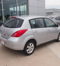 nissan versa 2012 silver hatchback 1 8 s gasoline 4 cylinders front wheel drive automatic 76116