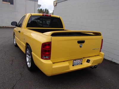 dodge ram pickup 1500 srt 10 2005 yellow pickup truck 2wd gasoline 10 cylinders rear wheel drive 6 speed manual 98371