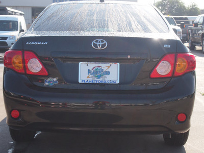 toyota corolla 2010 black sedan le 4 cylinders automatic 77338