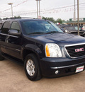 gmc yukon 2009 blue suv slt gasoline 8 cylinders 2 wheel drive automatic with overdrive 77657