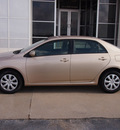 toyota corolla 2011 tan sedan le gasoline 4 cylinders front wheel drive automatic 77802