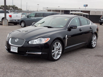 jaguar xf 2010 black sedan premium 8 cylinders automatic with overdrive 77074