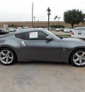 nissan 370z 2012 silver coupe 6 cylinders shiftable automatic 77477