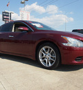 nissan maxima 2010 dk  red sedan 3 5 s gasoline 6 cylinders front wheel drive automatic 77521