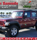jeep wrangler unlimited 2012 red suv sport gasoline 6 cylinders 4 wheel drive standard 77450