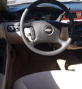 chevrolet impala 2010 gold sedan ls flex fuel 6 cylinders front wheel drive 4 speed automatic 76234