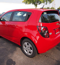 chevrolet sonic 2013 victory red hatchback ls gasoline 4 cylinders front wheel drive automatic 75075